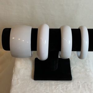 Vintage plastic bracelets. Set of four. Three different widths of bands.